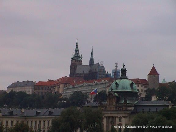 Prague Castle and St Vitus Cathedral above Church of St Nicolas in Lesser Quarter