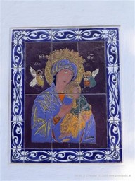 Decorated tile on wall, Calle 13