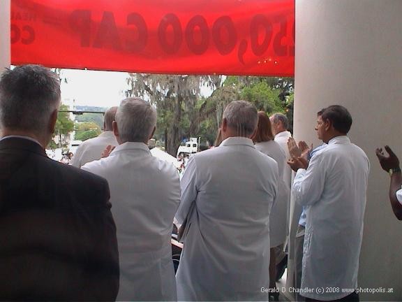 Doctors inside old Statehouse museum watching others protest